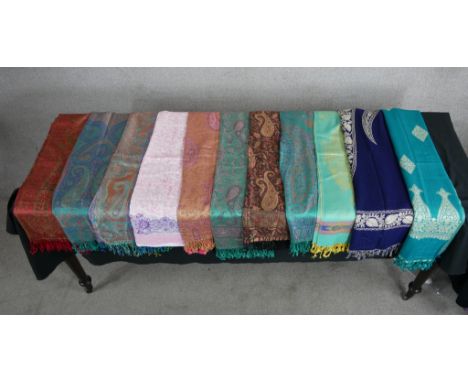 Eleven assorted vintage pashmina patterned scarves. 