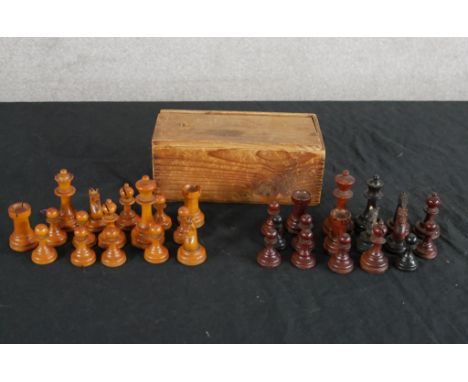 A matching and complete vintage boxwood chess set H.7 W.19 D.10cm 