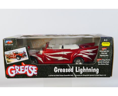 Joyride - A boxed 1:18 scale Joyride #33544 'Rydell High' Greased Lightning. The model appears to be in Mint condition, house