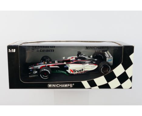 Minichamps- A boxed 1:18 scale European Minardi Cosworth PS03 Jos Verstappen car which appears Mint in a Good box with light 