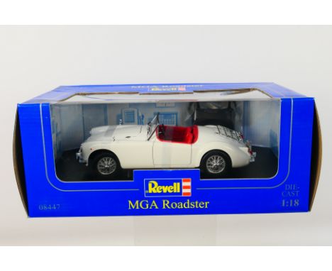 Revell - A boxed 1:18 scale Revell #08447 MGA Roadster. The model in white appears to be in Mint condition, presented within 