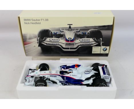 Minichamps - A boxed BMW dealer edition 1:18 scale BMW Sauber F1.08 Nick Heidfeld car # 80430444650. It appears Mint in a Goo