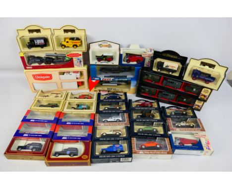 Lledo - 34 boxed diecast models vehicles mainly by Lledo in various scales. Lot includes Lledo #30002 1939 Chevrolet Panel Va