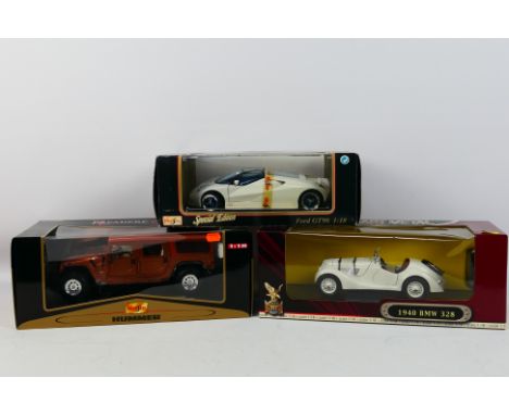 Maisto - Road Signature - Three boxed diecast 1:18 scale model cars. Lot consists of Maisto 'Special Edition' Ford GT90; Mais