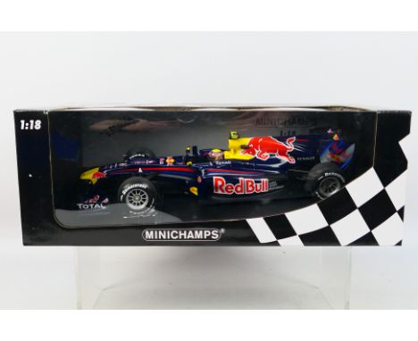 Minichamps - A boxed 1:18 scale Red Bull Racing Renault RB6 Mark Webber 2010 car # 110100006. It appears Mint in a Good box w