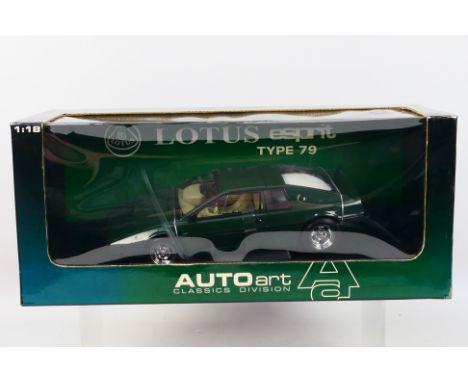 AutoArt - A boxed AutoArt #75302 1:18 scale Lotus Esprit Type 79. The model in green appears to be in Mint condition, housed 