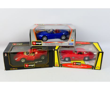 Bburago - Three boxed diecast 1:18 scale model cars from Bburago. Lot consists of Bburago #3033 Ferrari 250 Le Mans 1965; 'Co