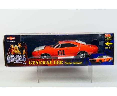 Hitari - A boxed Hitari radio control Dukes of Hazzard 'General Lee'. The model comes with transmitter and appears to be in M