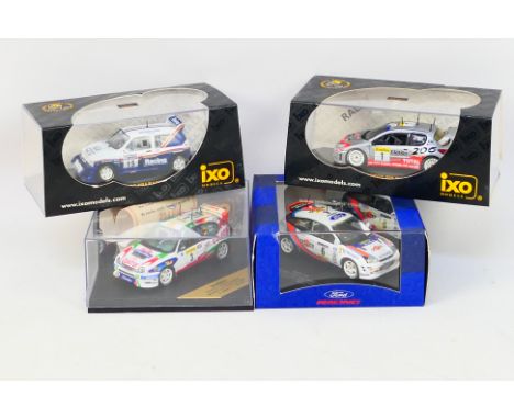 IXO Models - Vittese - Four boxed 1:43 scale diecast model rally cars. Lot consists of IXO Models Perugeot 206 WRC Burns / Re