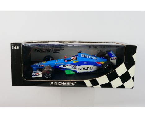 Minichamps- A boxed 1:18 scale Benetton Formula 1 Playlife B199 Alexander Wurz 1999 car which appears Mint in a Good box with