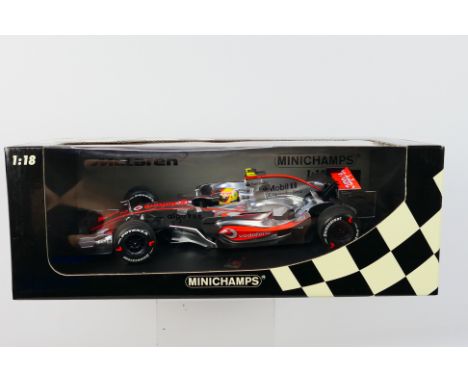 Minichamps - A boxed limited edition 1:18 scale McLaren Mercedes MP4-22 Lewis Hamilton 1st win Canada GP 2007 car # 530071822