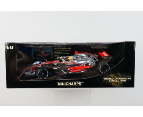 Minichamps - A boxed 1:18 scale Vodafone McLaren Mercedes MP4-23 Lewis Hamilton World Champion 2008 car which appears Mint in