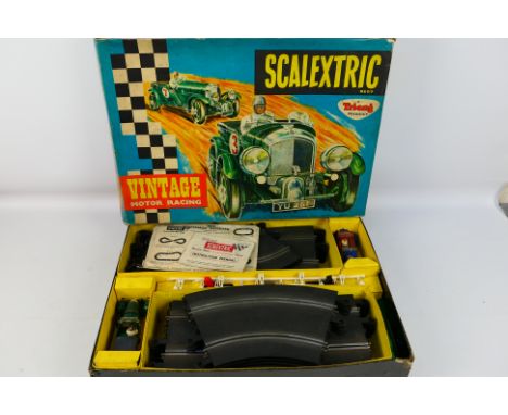 Scalextric - A boxed Scalextric 'Vintage Motor Racing' set # V33. Includes C64 Bentley 4.5 in Green and C67 Alfa Romeo in blu