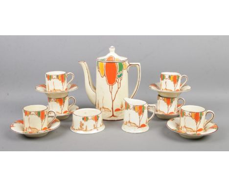 A T.G. Green &amp; Co. six place tea service in the 'Over the Hill' design, in the style of Clarice Cliff. Contains teapot, c
