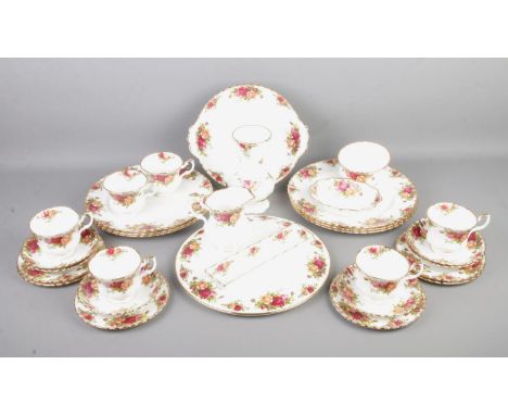 A collection of Royal Albert Old Country Roses ceramics to include dinner plates, milk jug, cups and saucers, etc.  