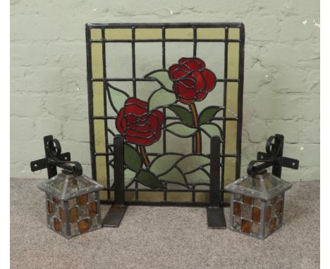 A collection of stained glass to include decorative Rose fireguard and pair of wall sconces formed as lanterns.  