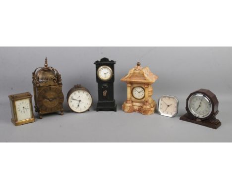 Seven assorted clocks, to include French carriage clock for repair, Mercedes marble temple clock, electric converted lantern 