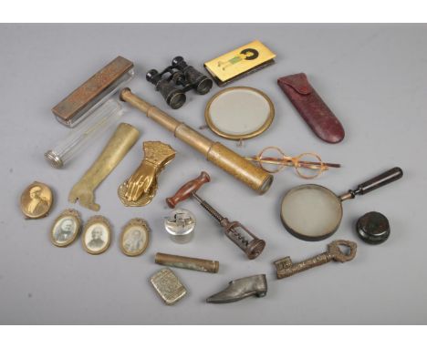 A box of small antique and later collectables including telescope, binoculars, corkscrews, spectacles, vesta case, magnifying