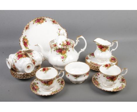 A six part Royal Albert Old Country Roses tea set including tea pot, cups and saucers, sugar bowl, side plates and jug  