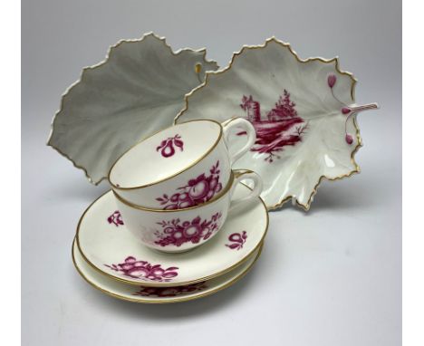 A pair of 20th century Hochst leaf formed dishes, one example with puce coloured landscape decoration, each marked beneath, L