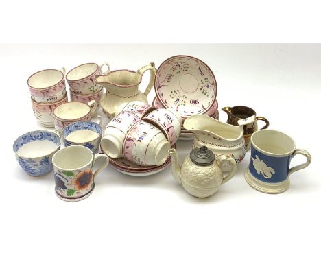 A group of pink lustre teawares, comprising nine tea cups, eleven saucers, jug, and boat, together with a small Gaudy Welsh c