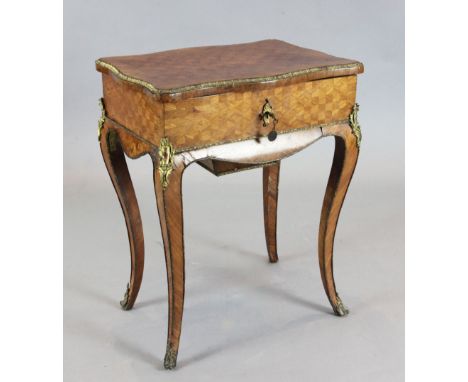 A 19th century French ormolu mounted kingwood work table, with internal mirror and frieze drawer, W.1ft 11in. D.1ft 5in. H.2f