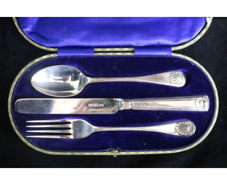 A George V silver christening trio by George Howson.