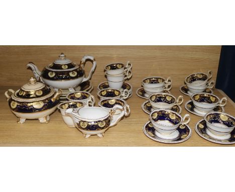 A Ridgway blue, gilt and cream decorated part tea service