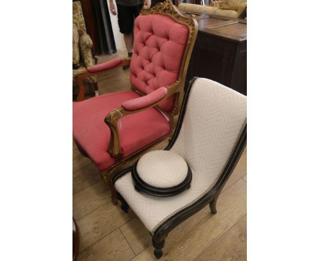 A nursing chair, foot stool and another chair