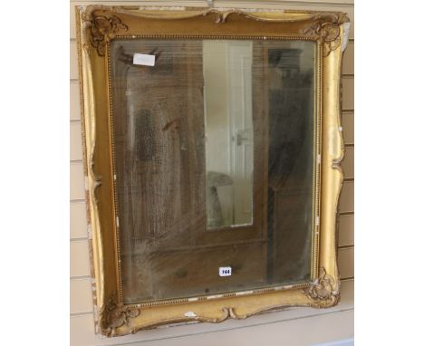 A gilt frame wall mirror, H.84cm