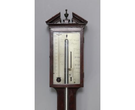 An early 19th century mahogany stick barometer, by William Wright of Ongar, with silvered scale and domed cistern cover, 3ft 