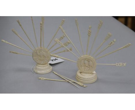 Two ivory cocktail stick holders