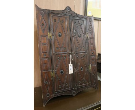 A Folk Art corner cupboard, H.65cm