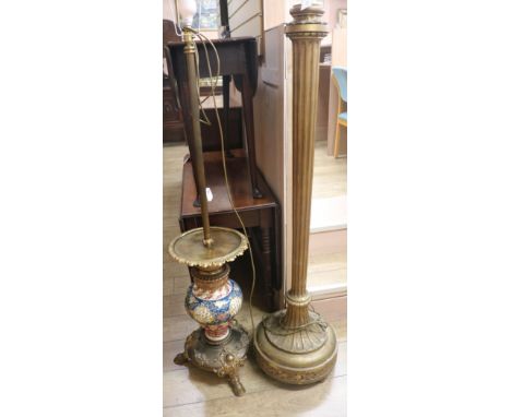 An ornate Zsolnay lamp standard and another gilt lamp standard, H.160cm & 140cm