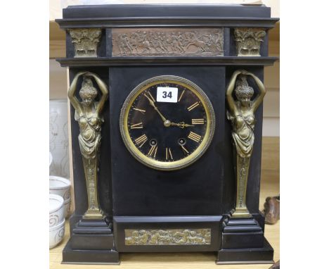 A black slate and gilt metal mantel clock
