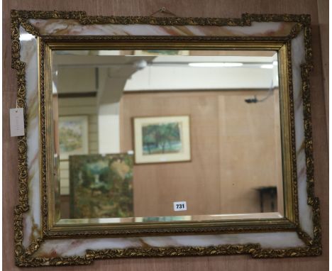 A wall mirror, W.80cm