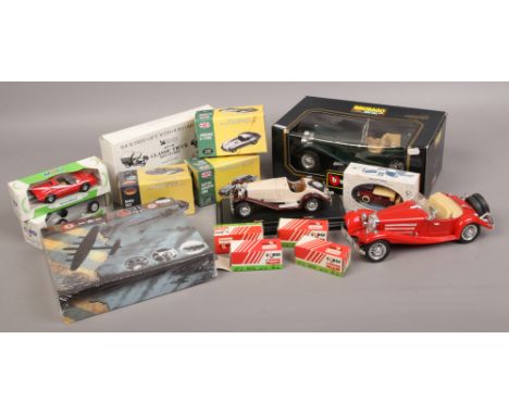 A quantity of mostly boxed Diecast metal model vehicles including Corgi, Burago, Lledo etc, along with a sealed boxed model o
