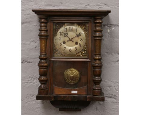 A walnut cased Springer wall clock with square brass dial.