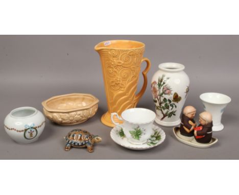 A quantity of collectables ceramics including Wade, Portmerioin, Wedgwood, Royal Albert, Sylvac and West German Goebel novelt