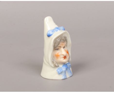 A Royal Worcester porcelain candle snuffer Mrs Caudle. Printed puce mark.Condition report intended as a guide only.Good condi