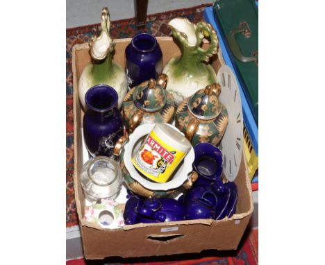 A box of miscellaneous including cobalt blue decorative pots, clock dial and reproduction advertising Marmite pot.
