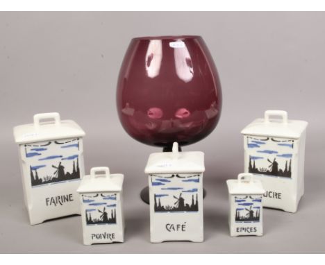 Five French ceramic storage jars, along with a large decorative coloured glass vase.&nbsp;Condition report intended as a guid