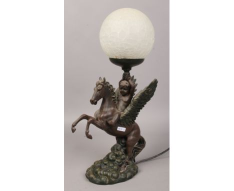 A composite table lamp formed as Pegasus winged horse with crackle glass shade.