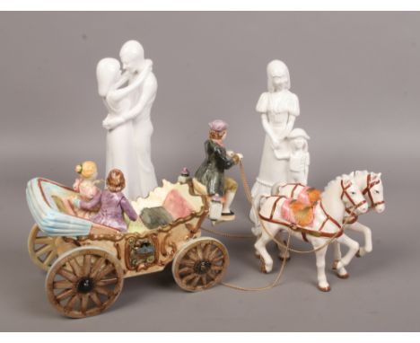 Two Spode ceramic figurines by Pauline Shone, one titled mother and child and the other embrace along with a ceramic figure g
