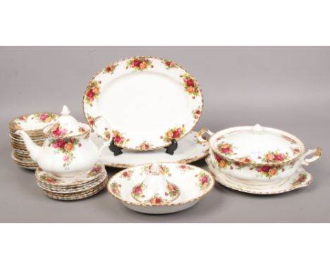 A Royal Albert Old Country Roses part tea / dinner service including tureen, tea pot, meat plate, saucers etc.