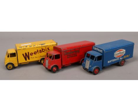 Three Dinky Diecast Guy vans all advertising Slumberland, Ever Ready and Weetabix