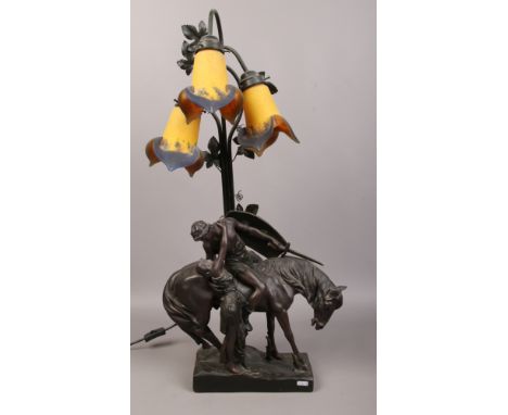 After Ferdinand Lugerth, a composite figural table lamp of a soldier on horseback and lover.