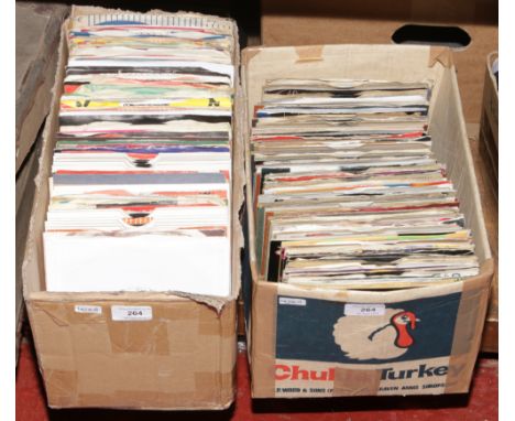 Two boxes of single records to include The Rolling Stones, Elvis, Bon Jovi etc.