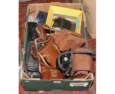 A box of assorted vintage cased cameras and photographic equipment including a boxed Kodak EK160 instant camera and binocular