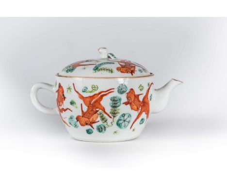 A polychrome porcelain teapot painted with red fishes and bearing a four character mark at the base China, early 20th century